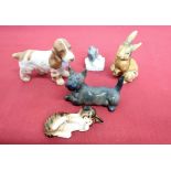 Royal Copenhagen model of a spaniel, a terrier and a mouse, a Royal Doulton model of a tabby