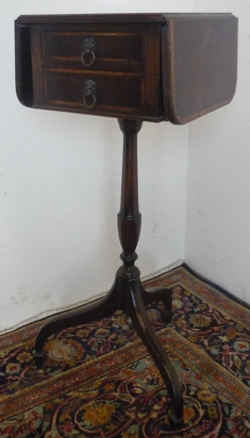 Small Geo. III style cross banded mahogany tripod Pembroke table, reeded top above two small drawers