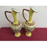 Pair of Doulton Lambeth faience (1872) floral decorated vases with three artist marks to the