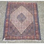 20th C Caucasian design wall rug, blue & red ground, central geometric medallion surrounded by