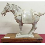 Tang style pottery model of a horse on rectangular wooden plinth, impressed RJW64 (W28cm, H30cm),