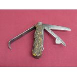 Late 19th C 'Game Keepers' pocket knife with 13 tools and 16 functions and twin antler grips.