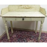 Victorian painted pine side table with raised back and sides above plank top on single long drawer