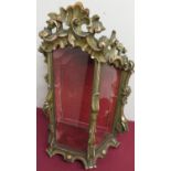 A carved and gilt wood framed table top bijouterie cabinet, with single interior shelf, rear opening