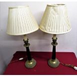 Pair of modern quality brass tapering column table lamps with circular bases, complete with