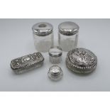 Collection of Victorian and later hallmarked silver topped dressing table jars (H7.5 cm) max, London