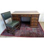 Titchmarsh and Goodwin cabinet makers of Ipswich: an oak twin pedestal desk, moulded rectangular top