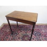 Victorian mahogany rectangular centre table with moulded top on ring turned tapering supports (