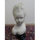 White marble bust of a young girl on black socle, stamped to reverse 932 (H44cm)