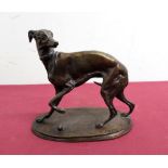 A bronze figure of lurcher type dog on oval base after Mene, the base marked P.J.Mene (H13.5cm)