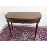 Gillows style mahogany D shaped folding tea table, with reeded top and twin gate action on ring