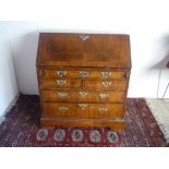 Late 18th Century cross and herringbanded walnut bureau, slope fall front revealing a fitted