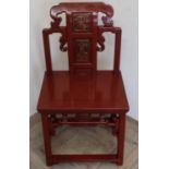 Chinese Cheching red lacquered elm chair with pierced and carved back, solid seat with pierced