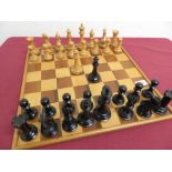 Quality 20th C large boxwood and ebonised chess set with weighted bases (King H10cm), complete