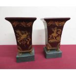 Pair of burgundy Toleware vases of square tapering form with gilt pen work decoration, on gilt metal