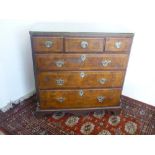 18th Century cross and herringbanded walnut chest of three short and three long drawers, with reeded