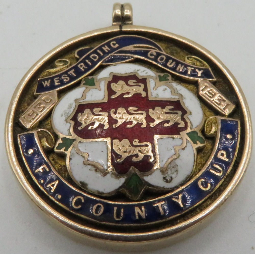 9ct gold hallmarked and enamelled West Riding County 1930-1931 F.A County Cup circular medallion, (