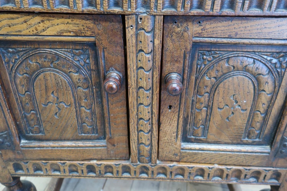 Small 17th C style oak court cupboard, with lunette carved frieze and arch panel door with - Image 2 of 2