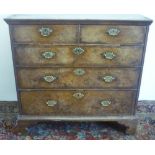 18th C crossbanded figured walnut chest of two short and three long graduated drawers, with