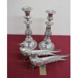 Pair of EP on copper table candlesticks, with urn sconces, baluster stems and circular bases, (