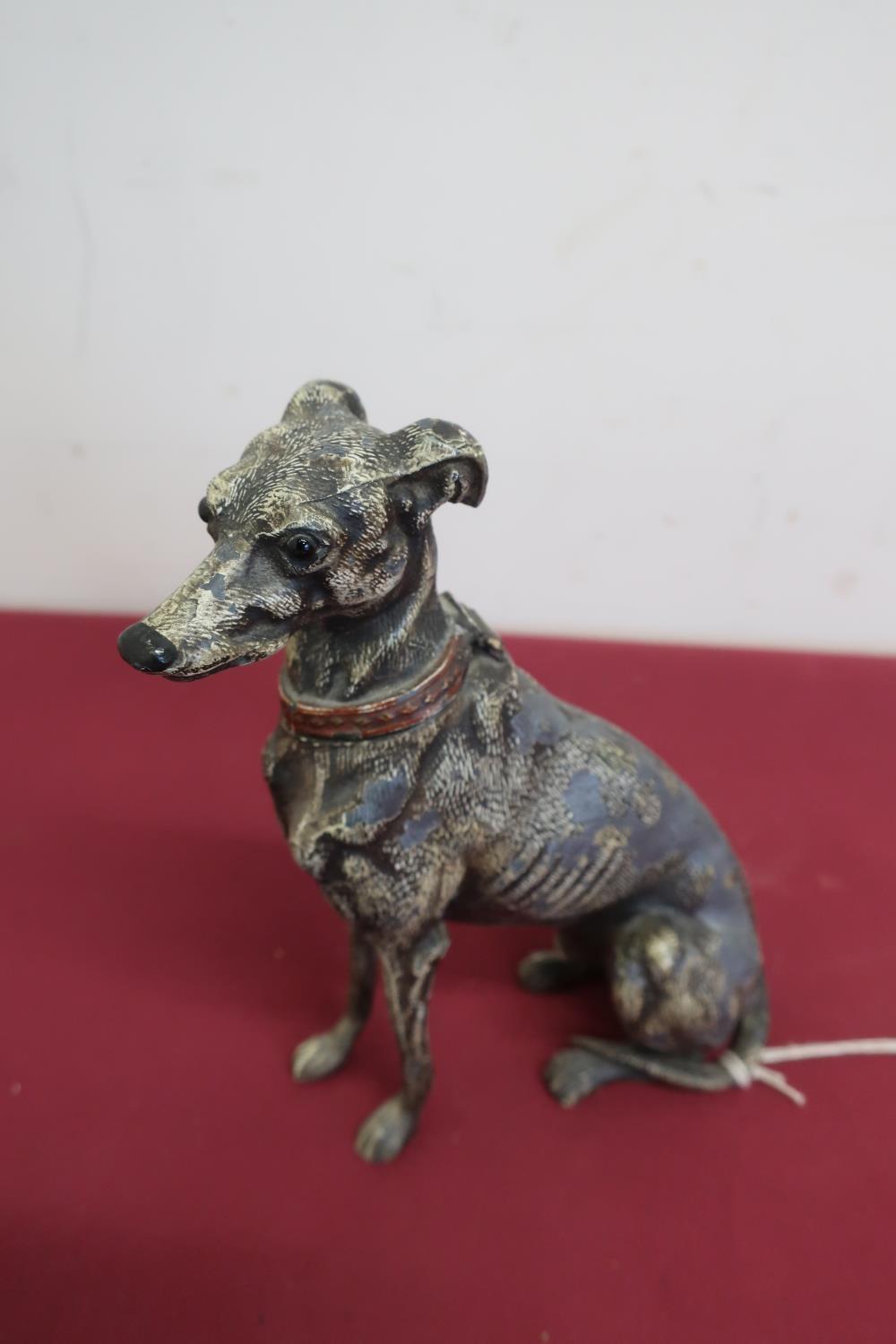 Late Victorian painted cast Spelter table cigarette lighter in the form of a seated greyhound,