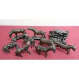 Collection of eight Chinese bronze models of horses with glass eyes, in various stances, on carved