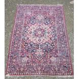 Pair of 20th C Caucasian Kazak style wall rugs, red ground, floral central medallion, pattern floral