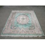 20th C chinese embossed wash woolen rug, green ground central floral pattern medallion, floral
