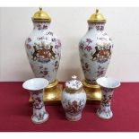 A pair of Chinese export ware Armorial porcelain vases with central crest and floral detail with