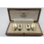 Pair of silver gilt hallmarked cuff-links, enamelled with a green bottle, with an Asprey 166 Bond