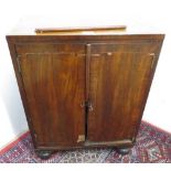 Small early Victorian mahogany cabinet, the oak interior fitted with drawers and compartments