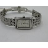 Oris lady?s automatic wristwatch with date. Stainless steel case and bracelet. Visible case back