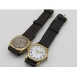 Swiss hand wound wristwatch, 9ct gold cushion case, wire lugs on leather strap. Case back hallmarked