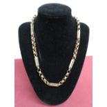 Gold watch chain of faceted and elongated link form, (L49cm) 38.8g