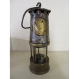 Brass and steel miners lamp stamped HE (22cm)