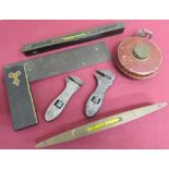 Victorian ebony brass bound spirit level, a Victorian ebony brass bound set square, a J.Rabone &