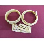 Victorian ivory bangle, ivory bracelet inset with marcasites, and two simulated ivory bracelets (4)