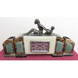 Art Deco coloured marble and alabaster three piece clock garniture with silvered Arabic dial, and