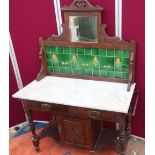 Edwardian mahogany wash stand, mirror back with Art Nouveau tiles and white marble top above two