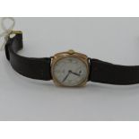 Omega hand wound wristwatch. 9ct gold case stamped .375 and numbered 971867. Leather strap and later