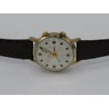 Poljot hand wound wristwatch alarm. Gold plated case on leather strap, 18 jewel movement