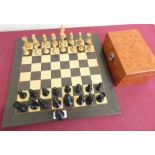 Large turned wooden and ebonized chess set, on chessboard in box (king H6.5cm)