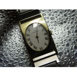 Omega lady?s hand wound wristwatch. Gold plated rectangular case with oval dial aperture. Case