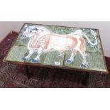 Tile topped conservatory table, decorated in colours with Spanish bull signed R.J.W in oak frame