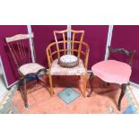 A 1920s walnut elbow chair, a needlework footstool, an Edwardian slat back chair and a Victorian