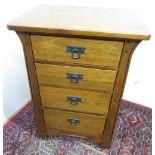 Arts and Crafts style oak chest of four graduated drawers with overhanging top on plain supports. (