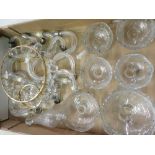 Cut glass chandelier parts including a 'S' shaped scroll arms, drip trays, faceted pendants, etc