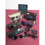 Collection of designer sunglasses including Ray Ban, Ubex, Boss, etc in one box