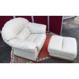 Cream leather arm chair and a similar rectangular foot stool (2)
