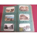 Album containing coloured and real photographic topographical views postcards of the Isle of Man,